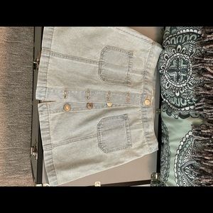Denim skirt button fly.